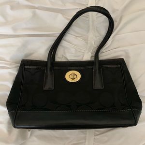 black coach hand bag
